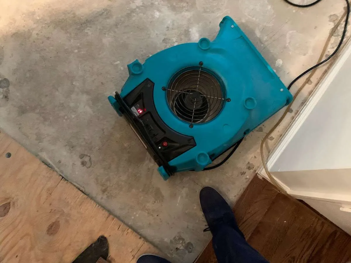 Air mover drying subfloor during Leak Detection & Repair in Zuni Pueblo